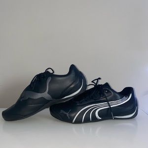 Puma black and silver sneakers